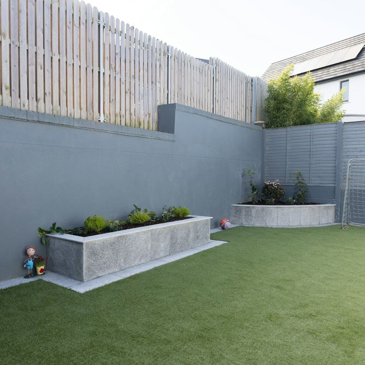 Artificial grass / astroturf surface being cleaned and brushed professionally
