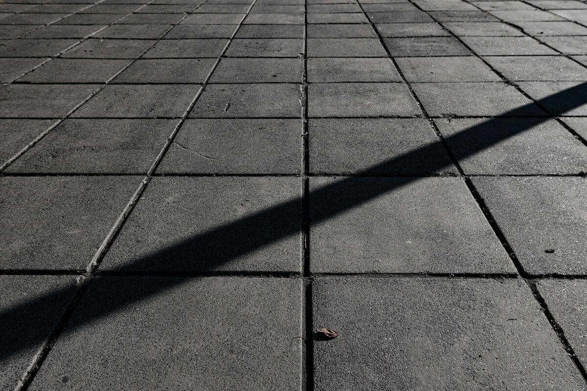 Dark slate floor tiles with natural lustre restored after professional cleaning
