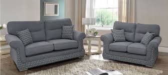 Upholstered armchair being deep-cleaned with extraction equipment
