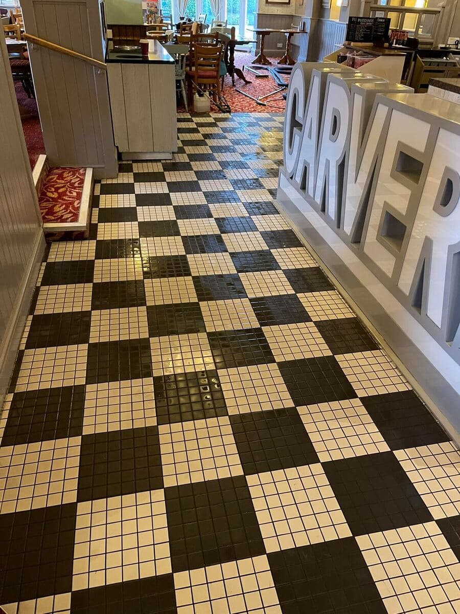 Ceramic tile floor with bright grout lines after professional deep clean
