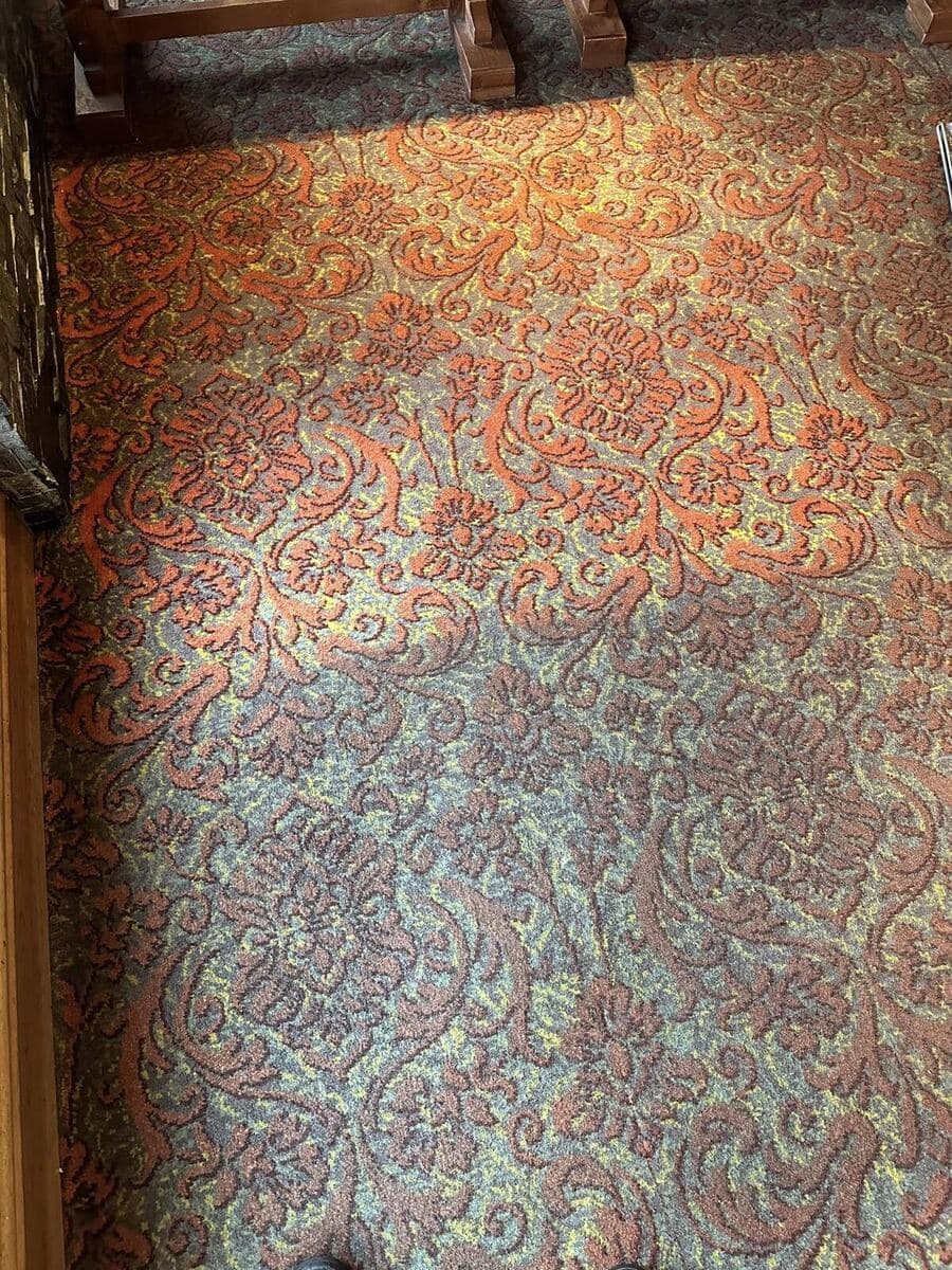 Professional carpet cleaning of a commercial floor area